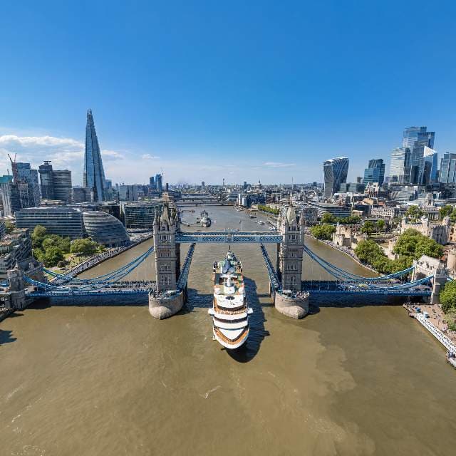 World Traveller Cruise Liner & Tower Bridge, London, UK.